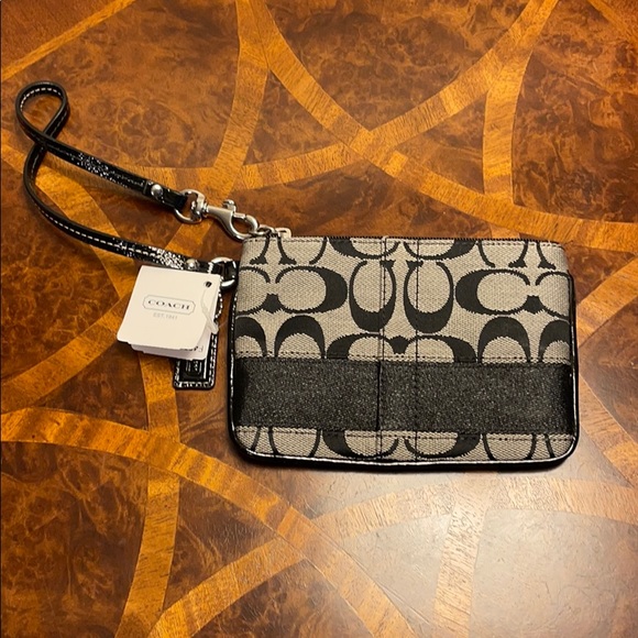 COACH signature strap wristlet - Picture 2 of 7